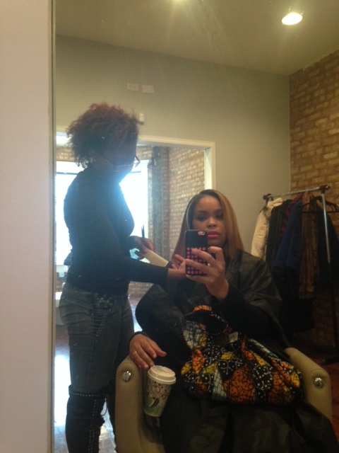 Stylist Nina Christmas clipping my ends.